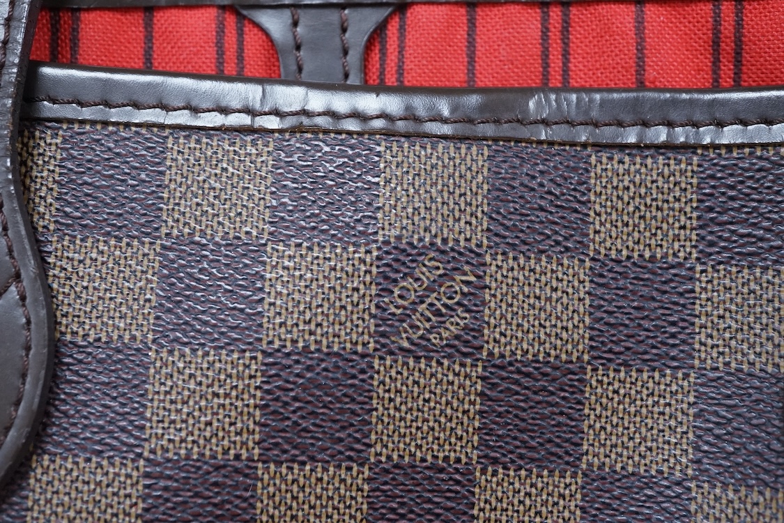 A Louis Vuitton Neverfull small tote bag, with interior pocket, numbered FH0168, 36cm wide